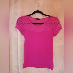 Pink short sleeve top with shear shoulders.
